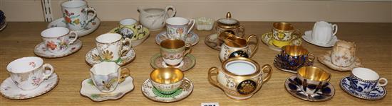 A group of 19th and early 20th century cabinet coffee cups and saucers and a Meissen cup and saucer c.1770